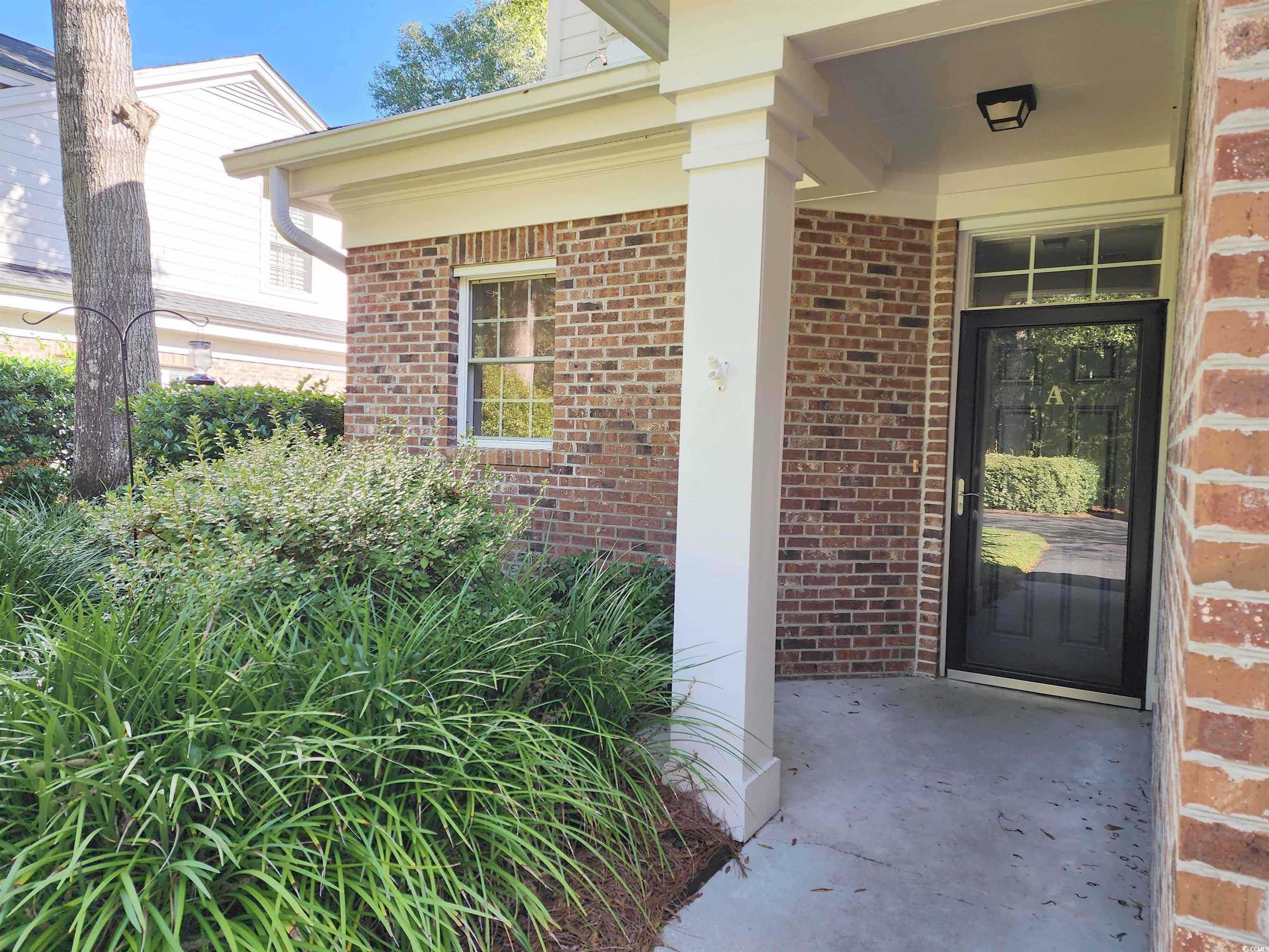 613 A Golden Bear Drive, Unit WOOD STORY LANDING PAWL Pawleys Island, SC 29585 - Photo 2 of 36