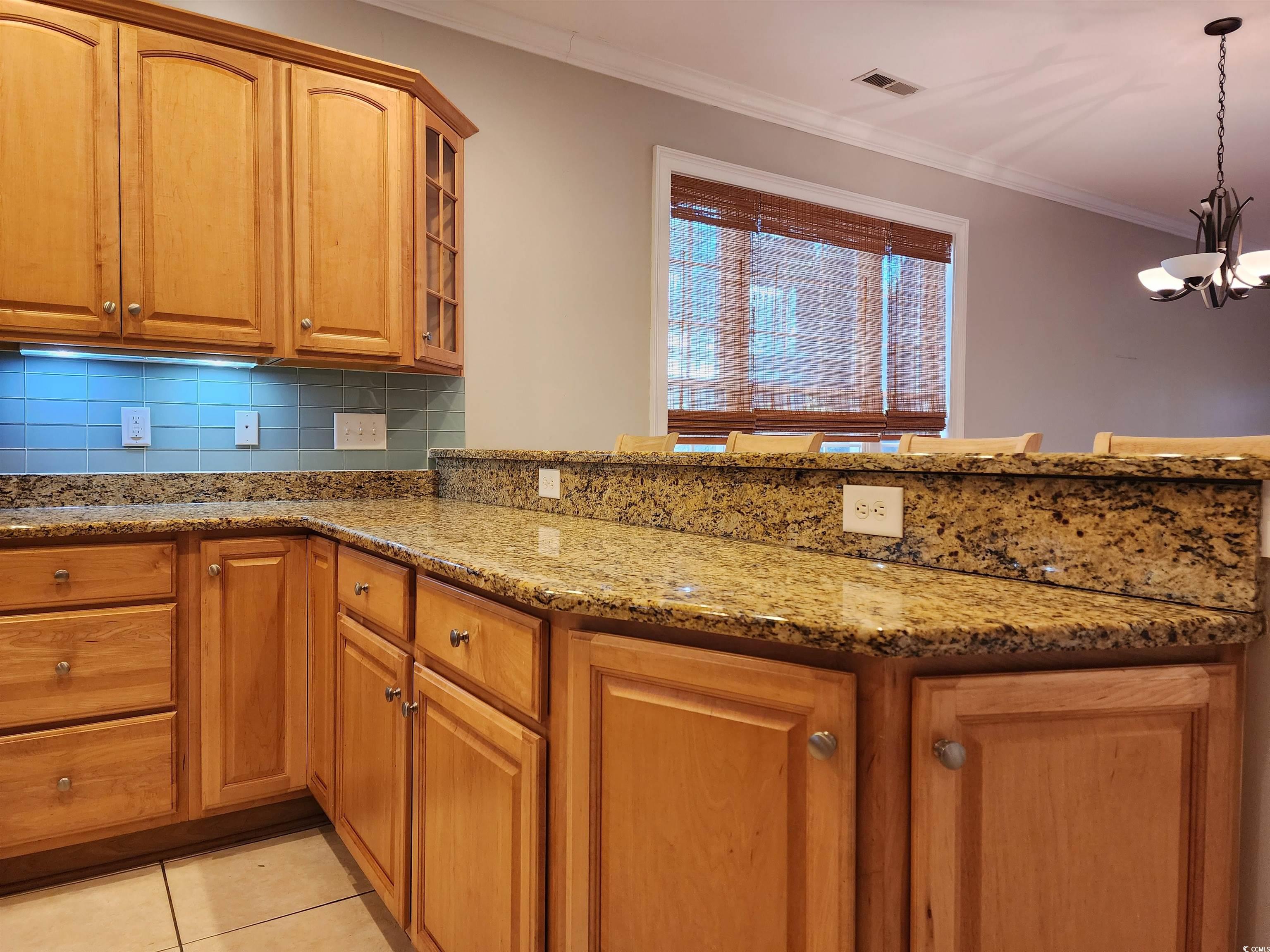 613 A Golden Bear Drive, Unit WOOD STORY LANDING PAWL Pawleys Island, SC 29585 - Photo 9 of 36