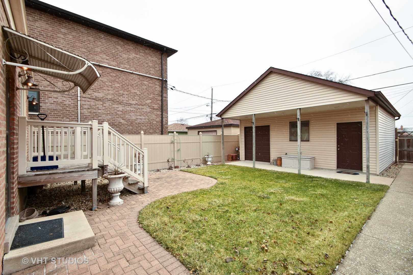 5155 South Mobile Avenue Chicago, IL 60638 - Photo 10 of 10 a view of a house with backyard sitting area and garden