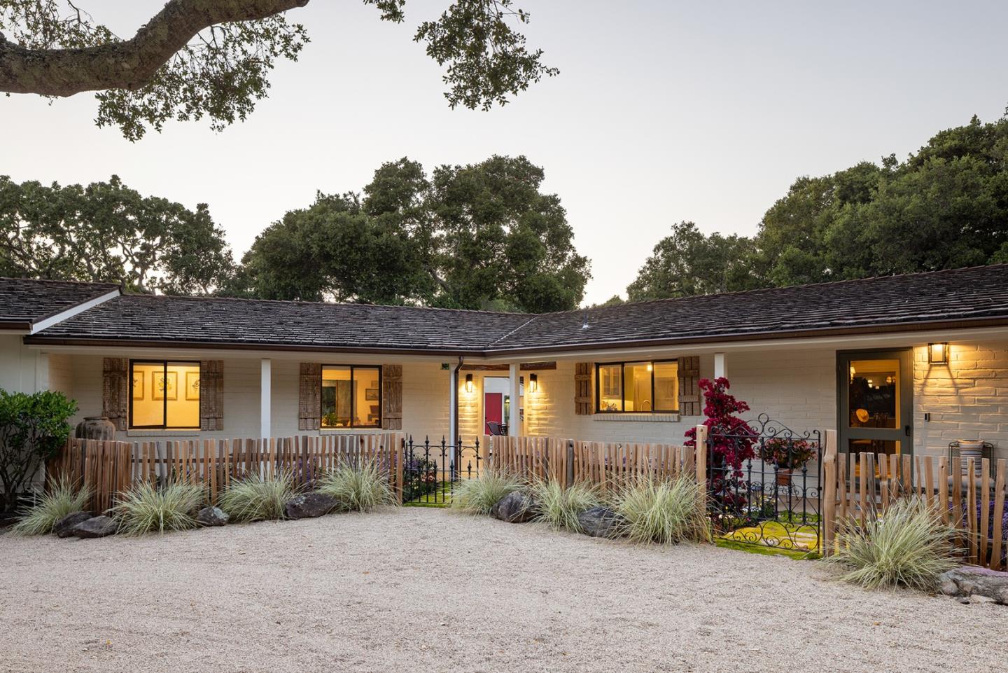 a view of a porch yard and front view of a house