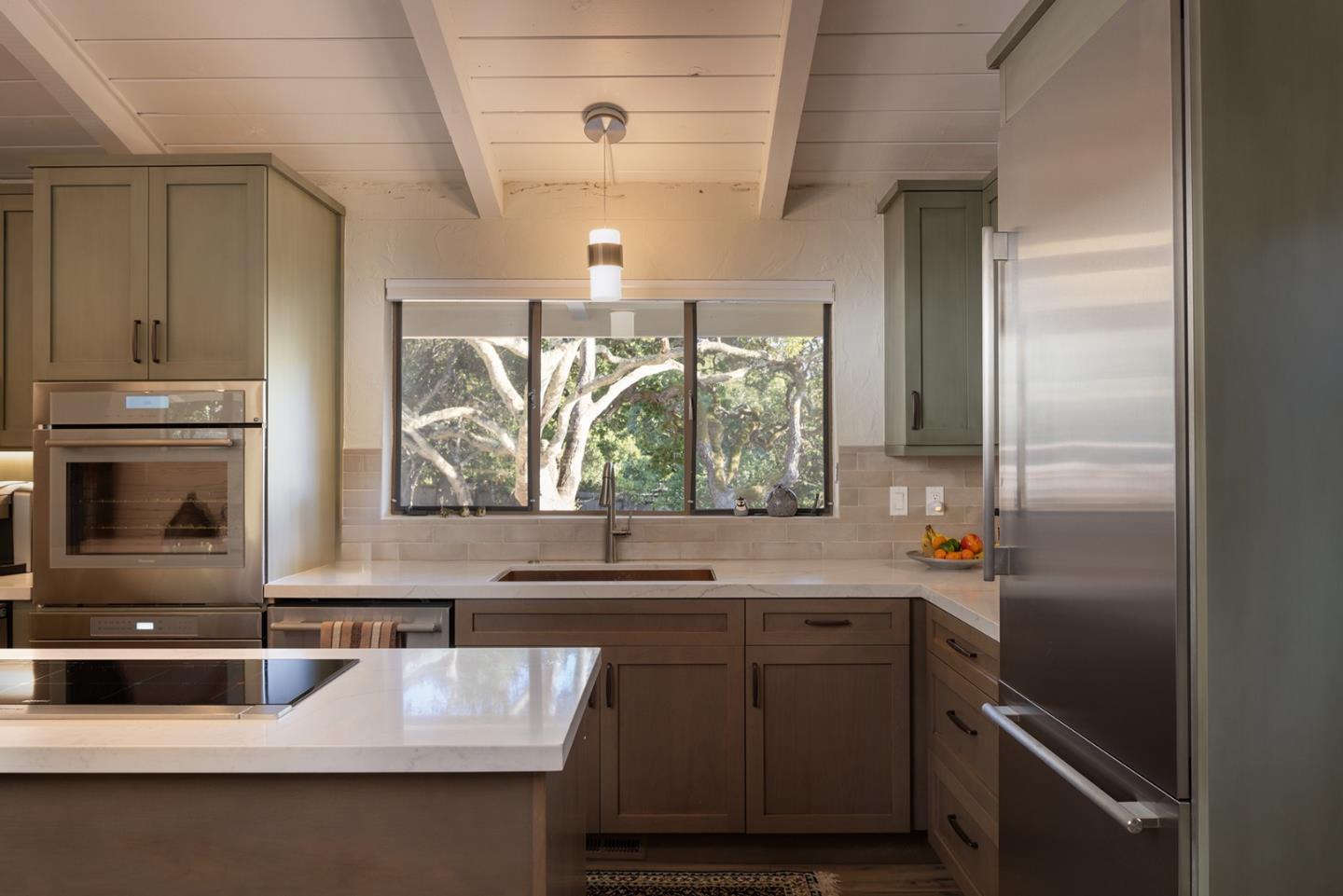 2 A La Rancheria Carmel Valley, CA 93924 - Photo 16 of 46 a kitchen with a sink and a refrigerator