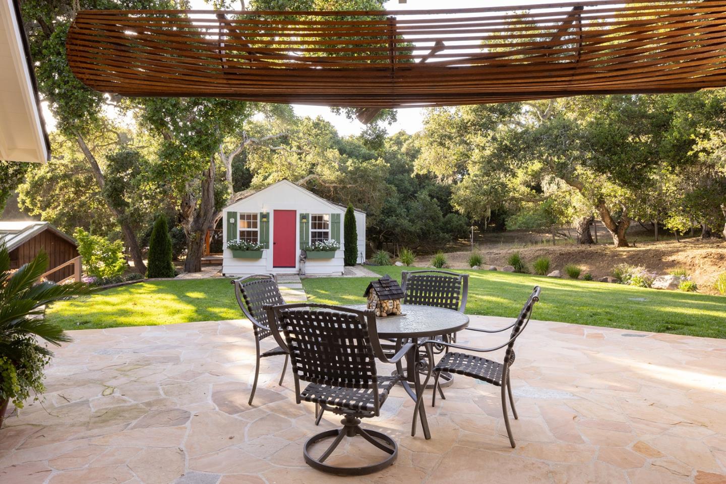 2 A La Rancheria Carmel Valley, CA 93924 - Photo 27 of 46 a view of swimming pool with lawn chairs and a patio