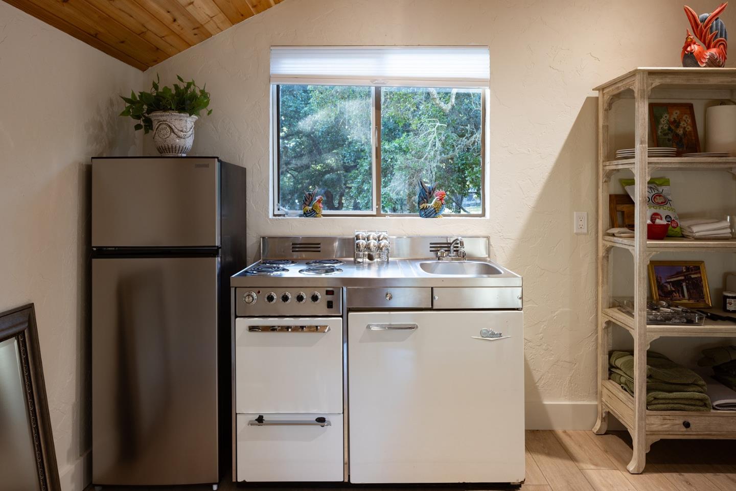 2 A La Rancheria Carmel Valley, CA 93924 - Photo 33 of 46 a kitchen with appliances a sink and a refrigerator