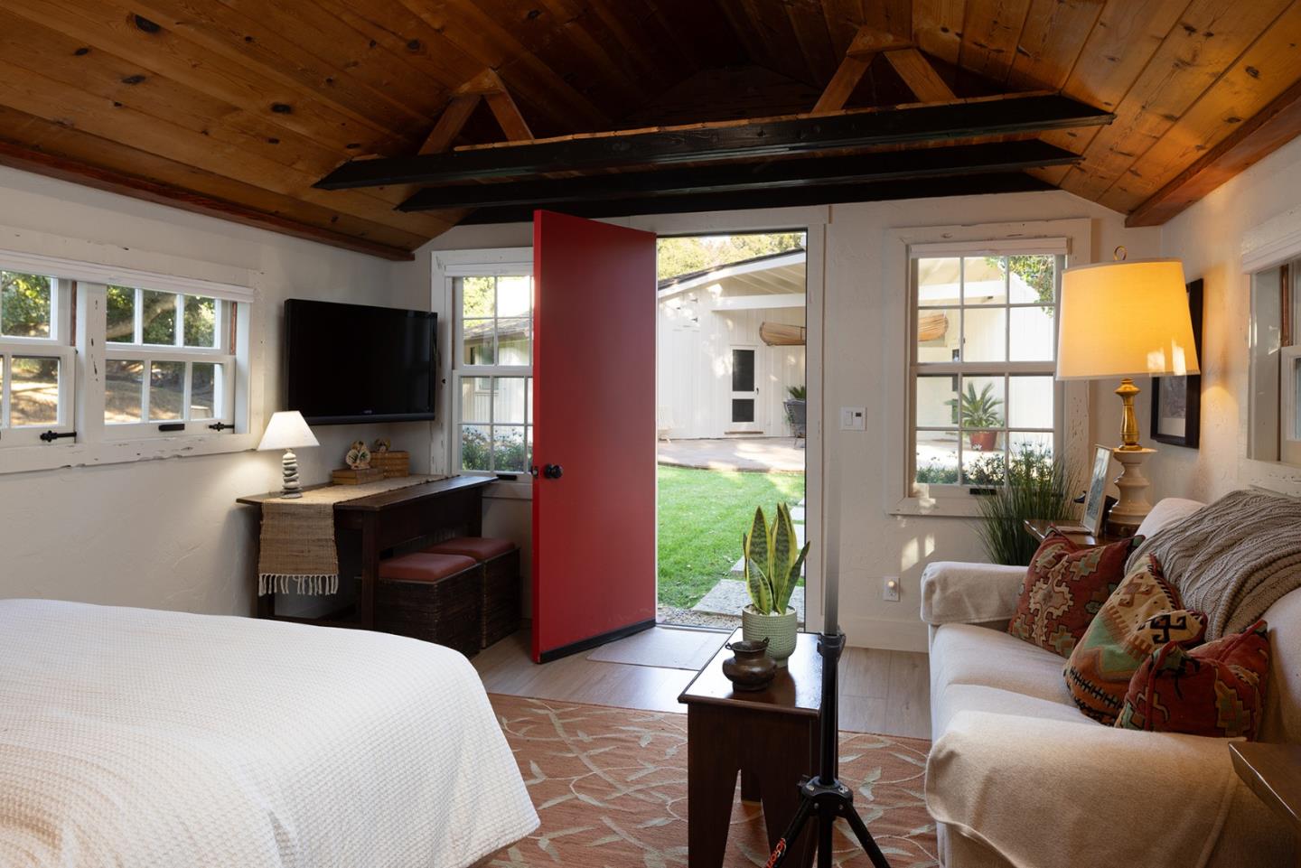 2 A La Rancheria Carmel Valley, CA 93924 - Photo 36 of 46 a bedroom with furniture and a flat screen tv