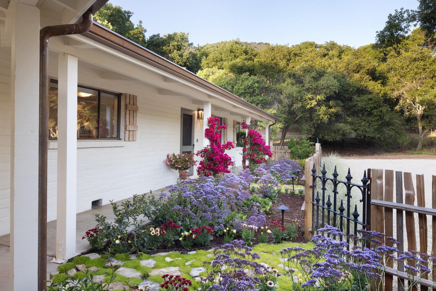 2 A La Rancheria Carmel Valley, CA 93924 - Photo 8 of 46 a view of a house with a flower garden