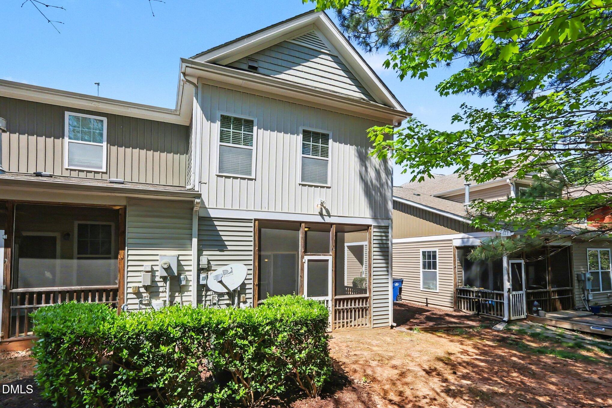 2409 Memory Ridge Drive Raleigh, NC 27606 - Photo 28 of 36 a front view of a house with garden