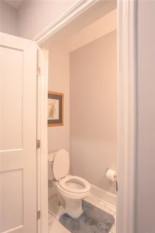 a bathroom with a granite countertop shower