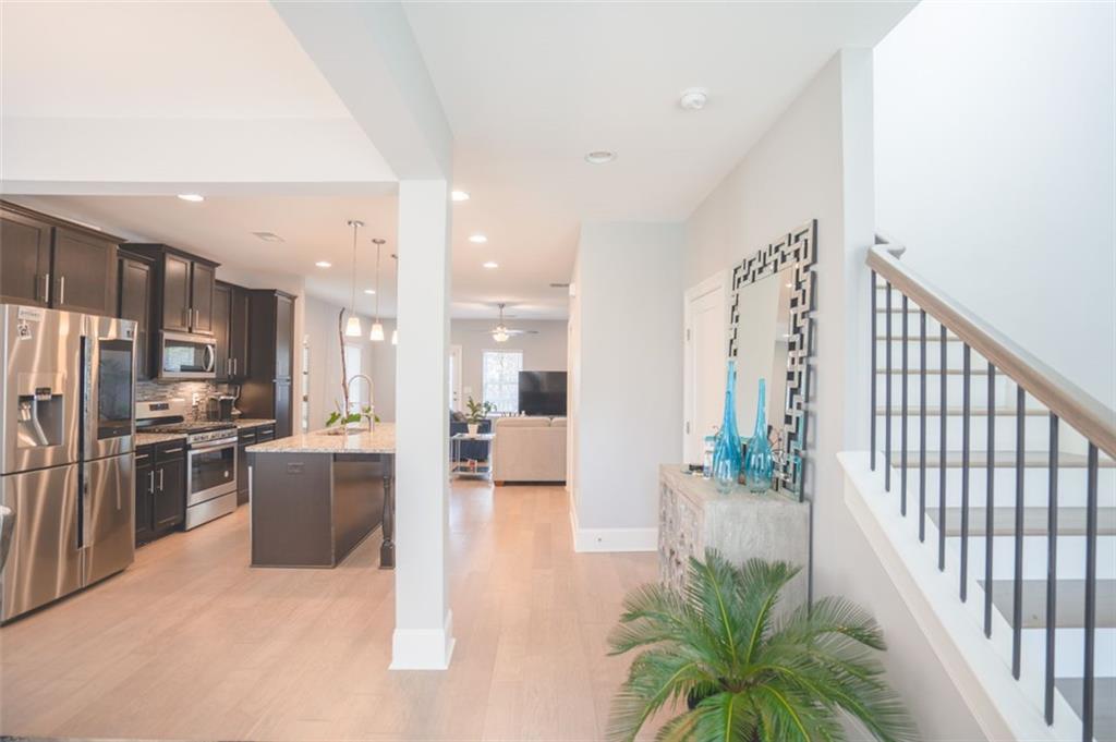 Undisclosed Address Atlanta, GA 30318 - Photo 5 of 19 a kitchen with furniture and a large window