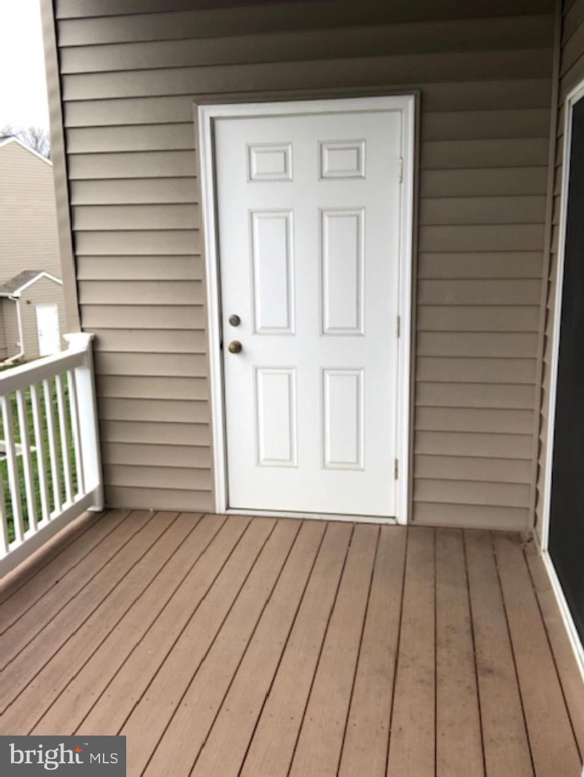525 Hometowne Terrace Lititz, PA 17543 - Photo 11 of 11 a view of a house with wooden deck
