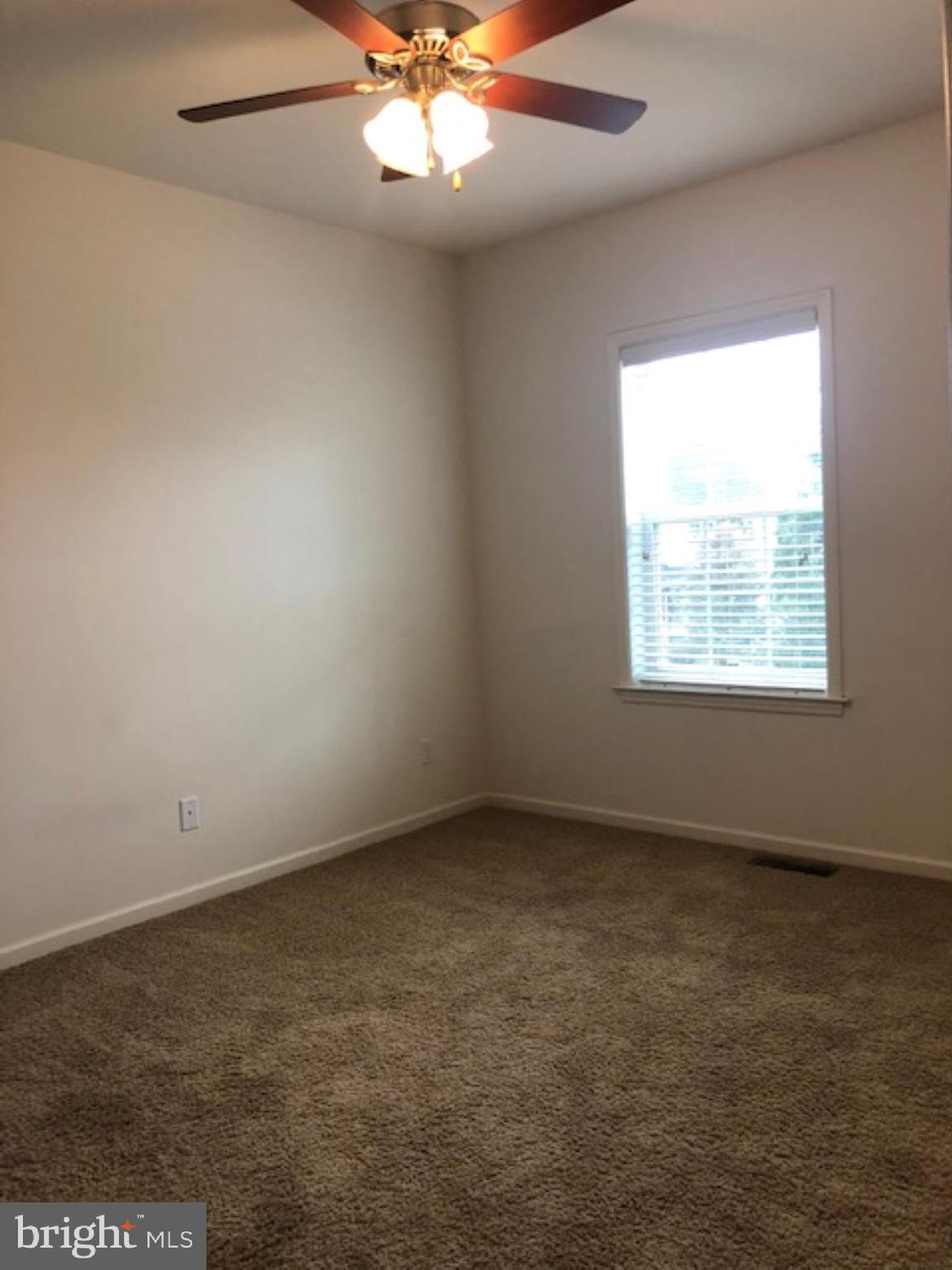 525 Hometowne Terrace Lititz, PA 17543 - Photo 6 of 11 an empty room with a window