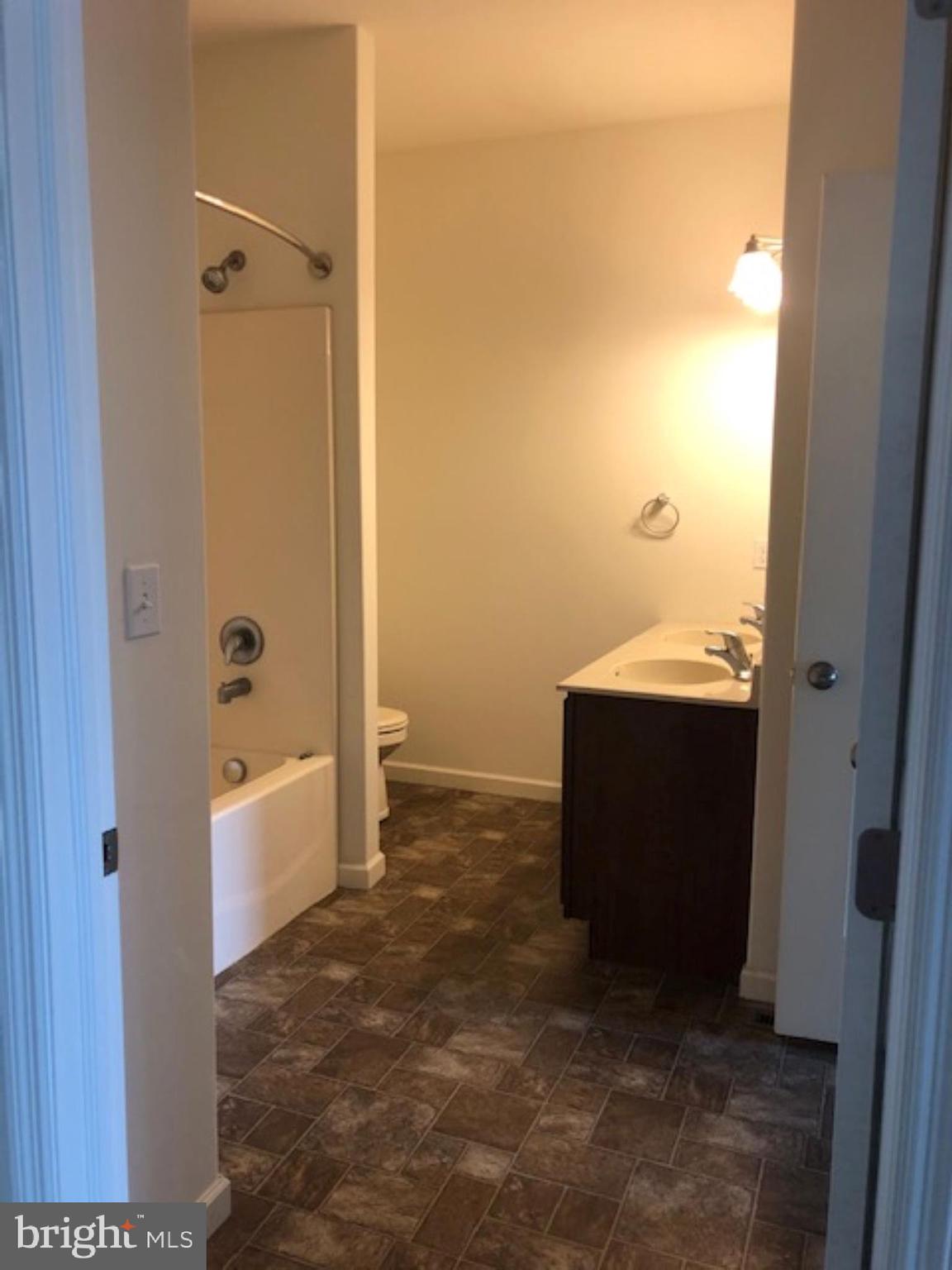 525 Hometowne Terrace Lititz, PA 17543 - Photo 7 of 11 a bathroom with a tub shower and sink