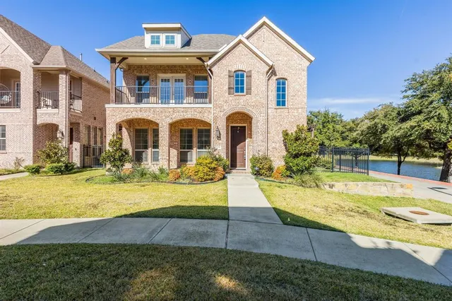 a front view of a house with swimming pool