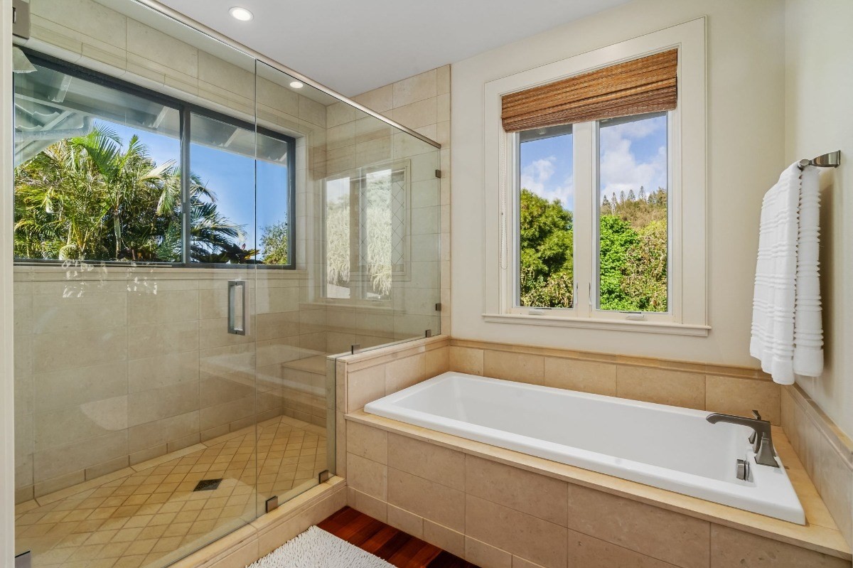1050 F Puu Road, Unit 1 Kalaheo, HI 96741 - Photo 16 of 25 a bathroom with a bathtub and shower