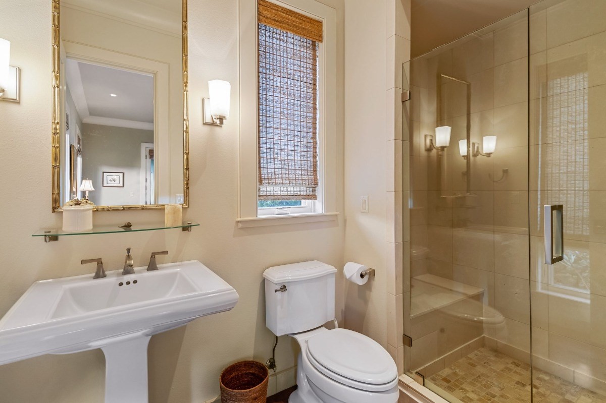 1050 F Puu Road, Unit 1 Kalaheo, HI 96741 - Photo 19 of 25 a bathroom with a sink toilet and shower