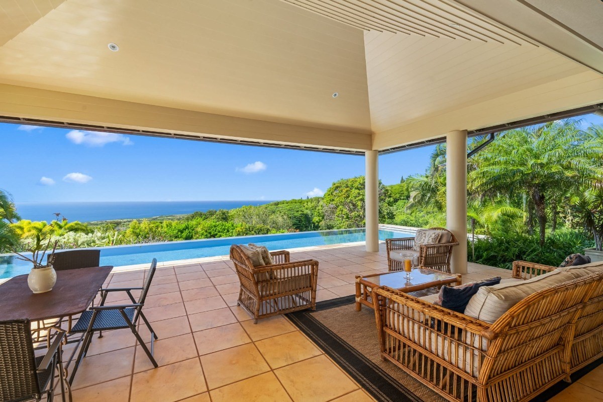 1050 F Puu Road, Unit 1 Kalaheo, HI 96741 - Photo 24 of 25 a balcony with furniture and a garden