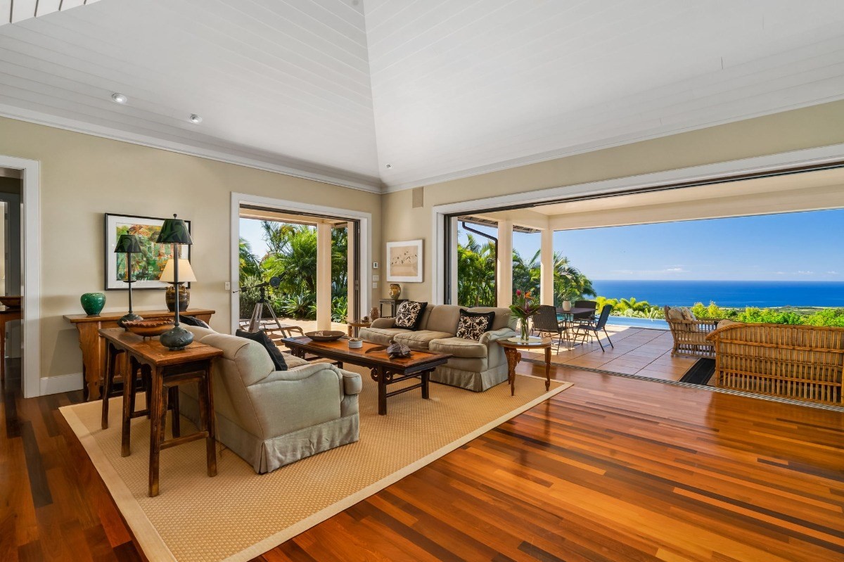 1050 F Puu Road, Unit 1 Kalaheo, HI 96741 - Photo 7 of 25 a living room with furniture and a large window