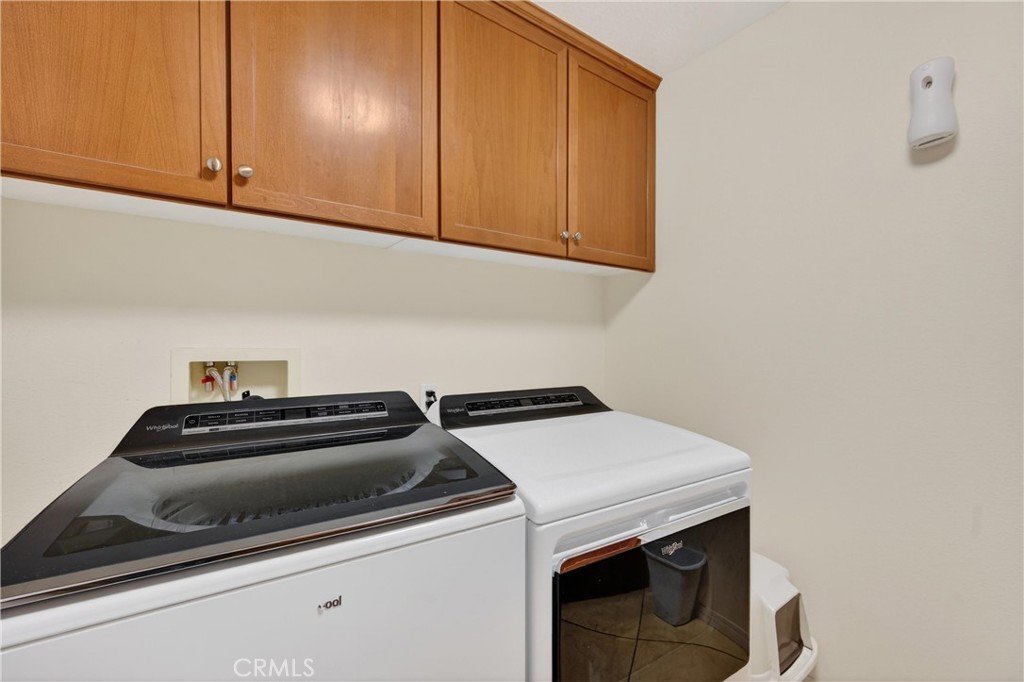 34581 Spindle Tree Street Winchester, CA 92596 - Photo 13 of 50 a utility room with dryer and washer
