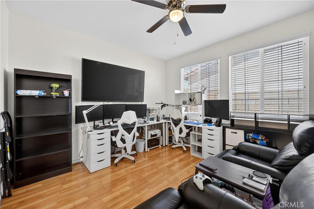 34581 Spindle Tree Street Winchester, CA 92596 - Photo 15 of 50 a view of a livingroom with workspace and a window