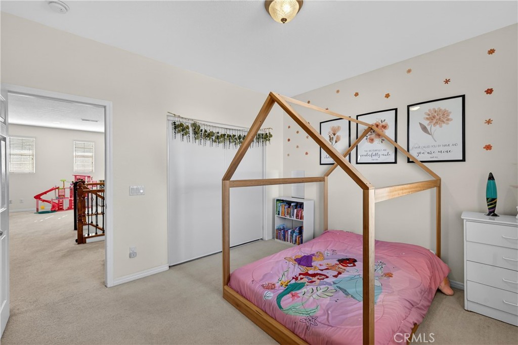 34581 Spindle Tree Street Winchester, CA 92596 - Photo 37 of 50 a bed room with a bed and a window