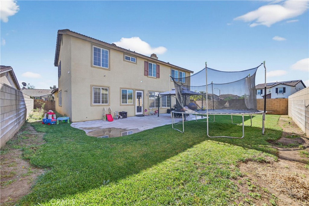 34581 Spindle Tree Street Winchester, CA 92596 - Photo 45 of 50 a view of a house with a backyard