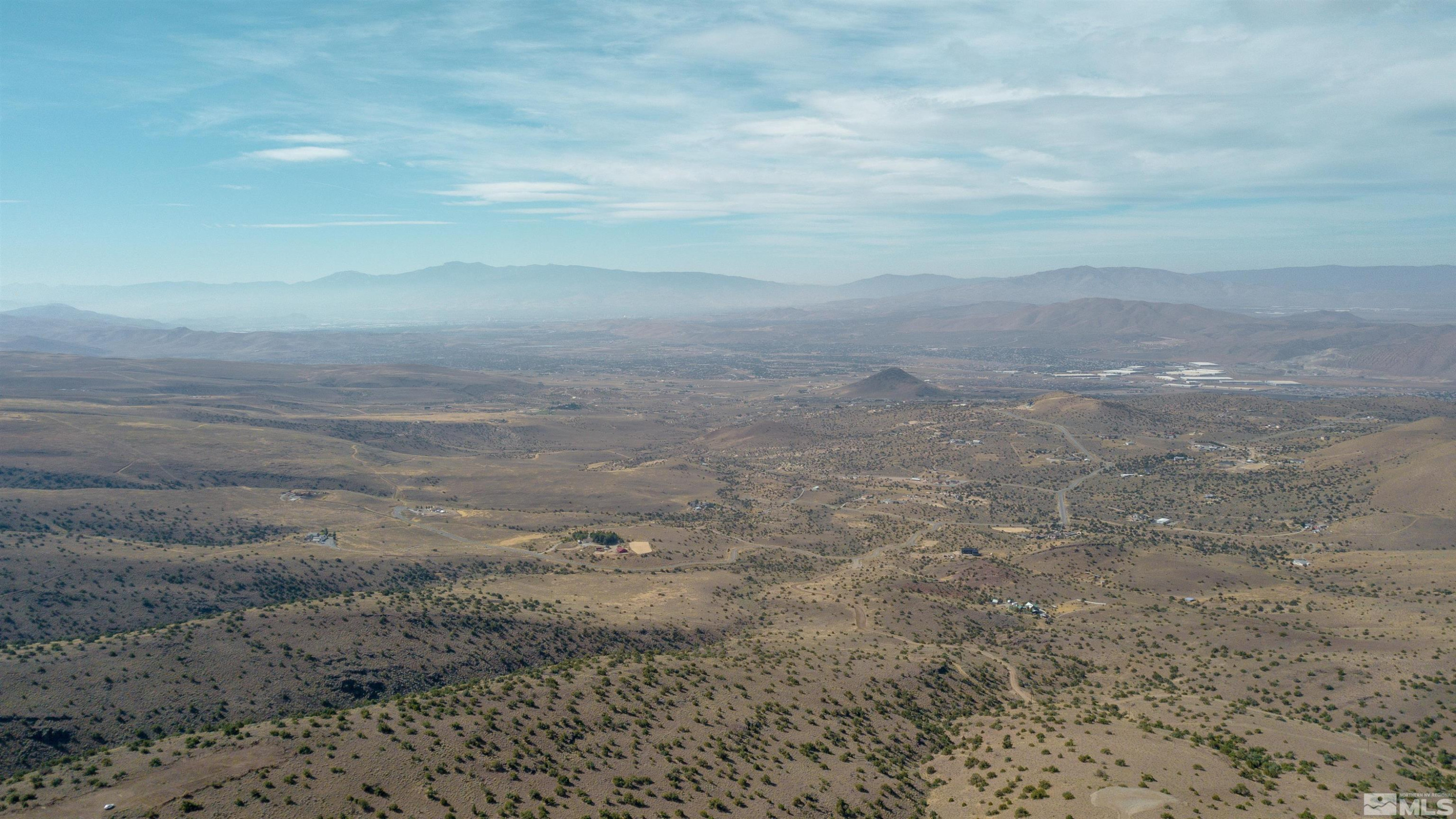 0 Curnow Canyon Road Sparks, NV 89441 - Photo 9 of 19 a view of a dry yard with wooden fence