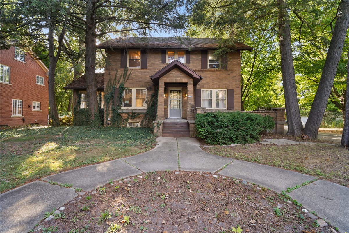 713 Normal Avenue Normal, IL 61761 - Photo 1 of 43 a front view of a house with garden