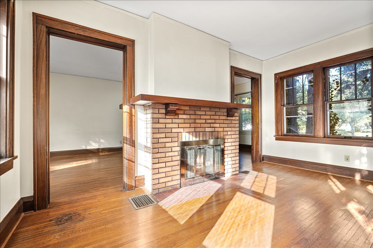 713 Normal Avenue Normal, IL 61761 - Photo 13 of 43 a view of empty room with wooden floor and fan