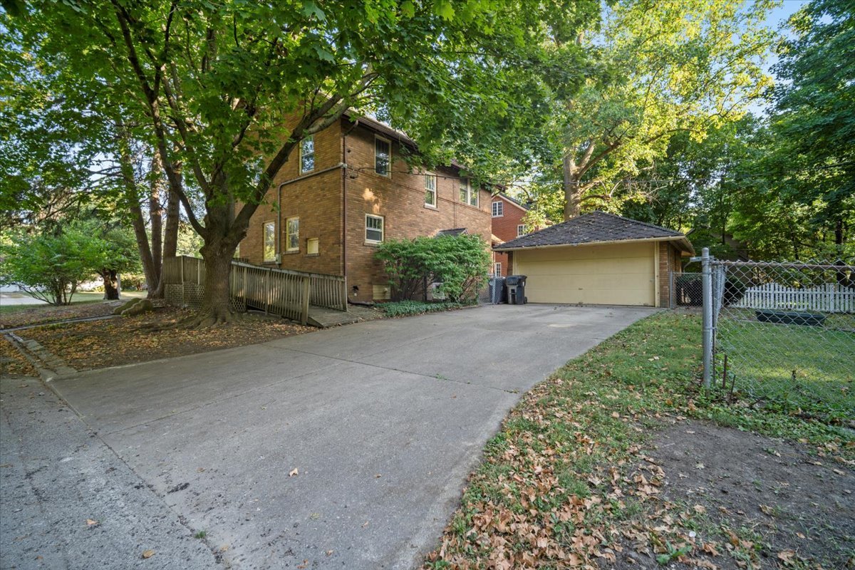 713 Normal Avenue Normal, IL 61761 - Photo 35 of 43 a front view of a house with garden