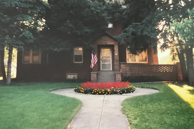 a front view of a house with yard