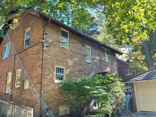 a brick building with a large windows