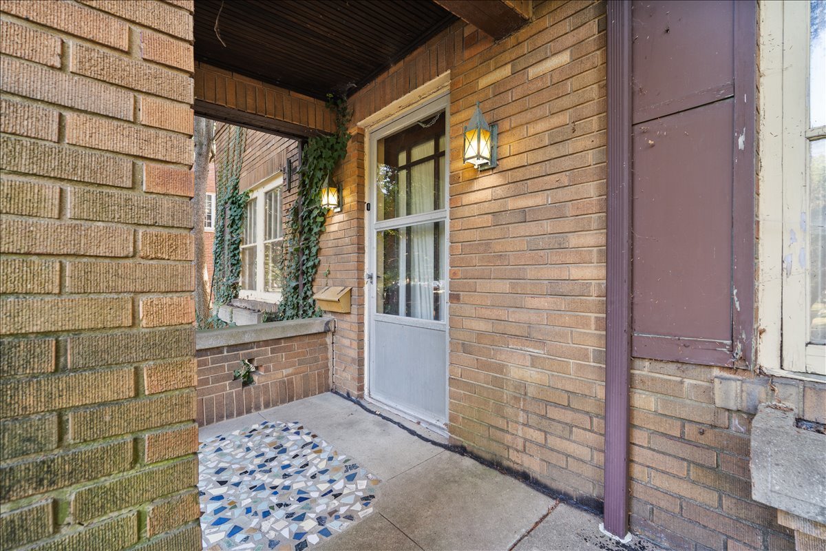713 Normal Avenue Normal, IL 61761 - Photo 7 of 43 a bathroom with a sink and a mirror