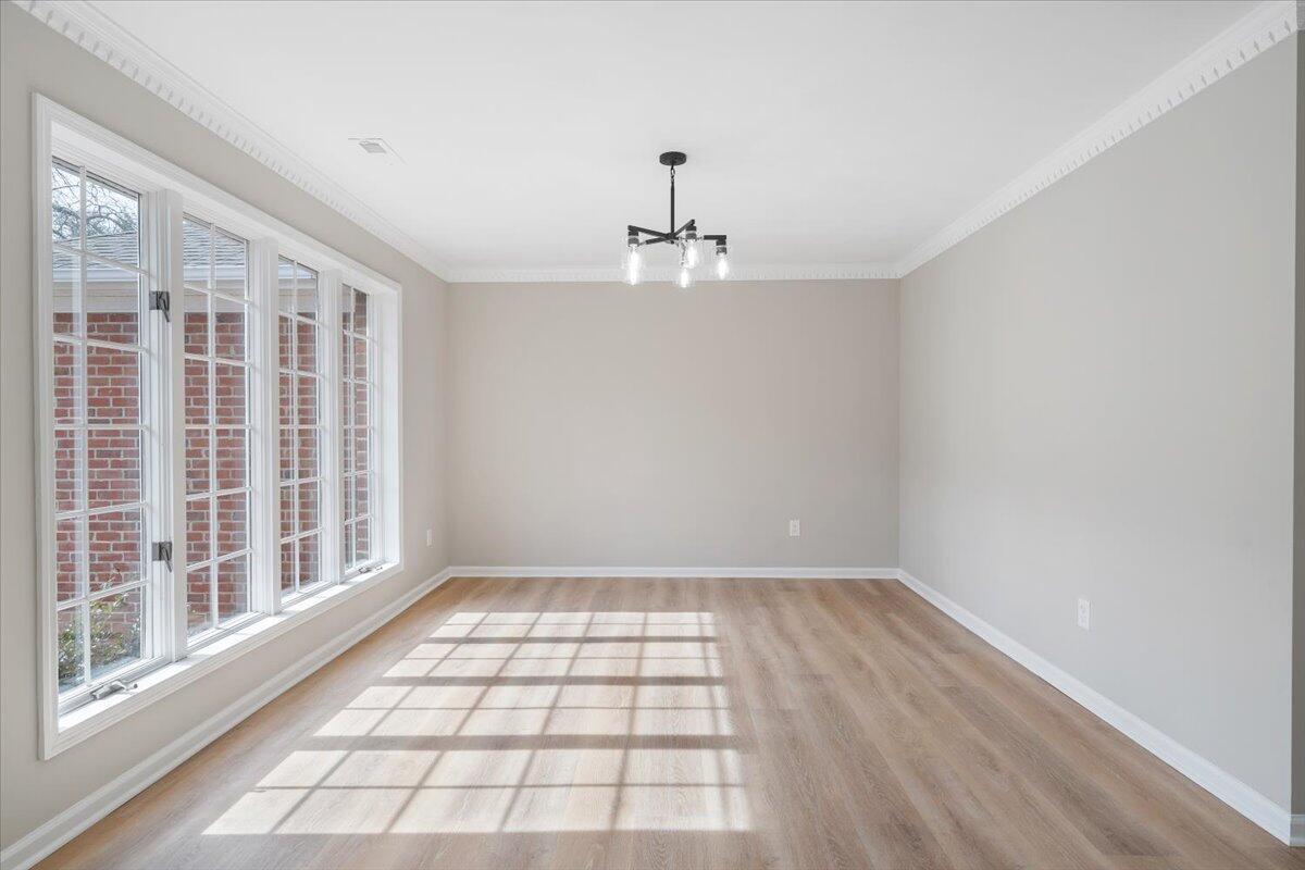 7951 Barrens Road Roanoke, VA 24019 - Photo 11 of 105 wooden floor in an empty room with a window