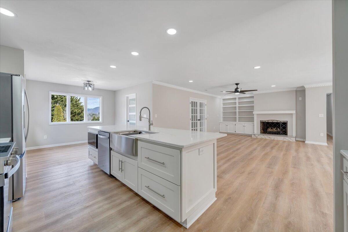 7951 Barrens Road Roanoke, VA 24019 - Photo 20 of 105 a kitchen with furniture and a wooden floor