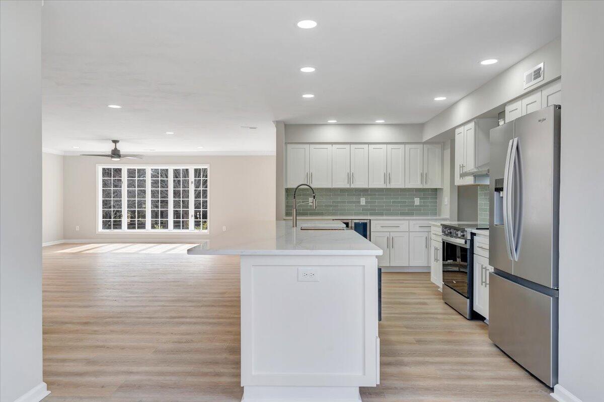 7951 Barrens Road Roanoke, VA 24019 - Photo 23 of 105 a kitchen with a refrigerator and a sink