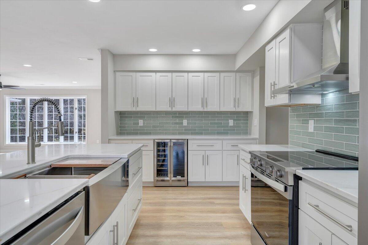 7951 Barrens Road Roanoke, VA 24019 - Photo 30 of 105 a kitchen with a sink stove and cabinets