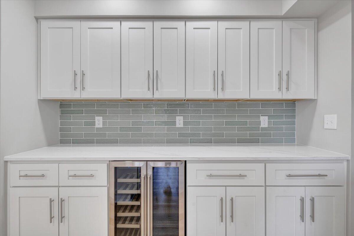 7951 Barrens Road Roanoke, VA 24019 - Photo 31 of 105 a kitchen with white cabinets and white appliances