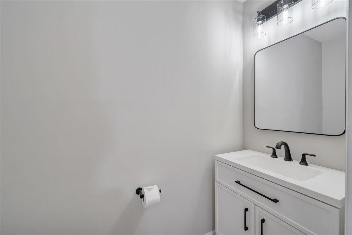 7951 Barrens Road Roanoke, VA 24019 - Photo 59 of 105 a bathroom with a sink and a mirror