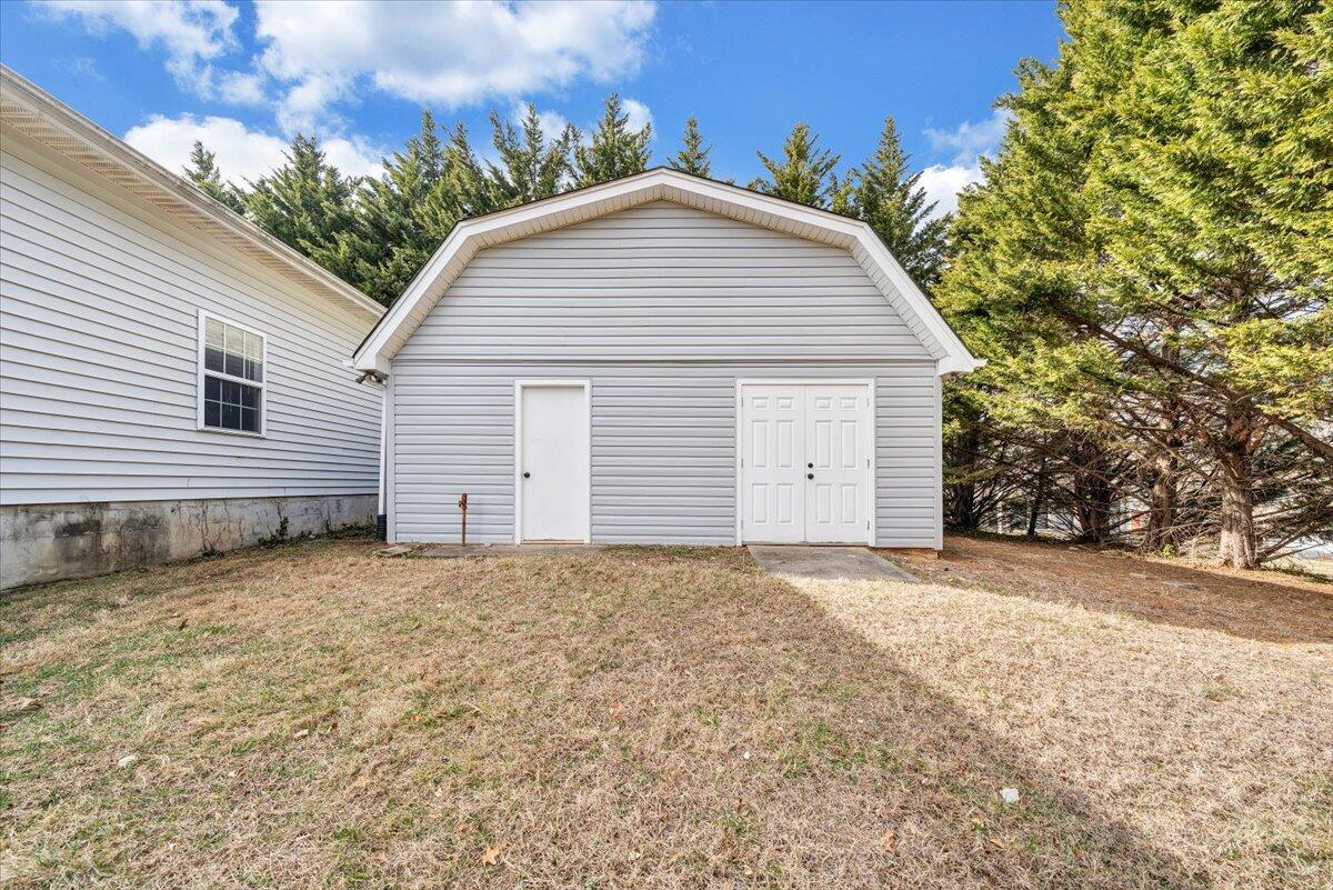 7951 Barrens Road Roanoke, VA 24019 - Photo 69 of 105 a view of a house with a yard