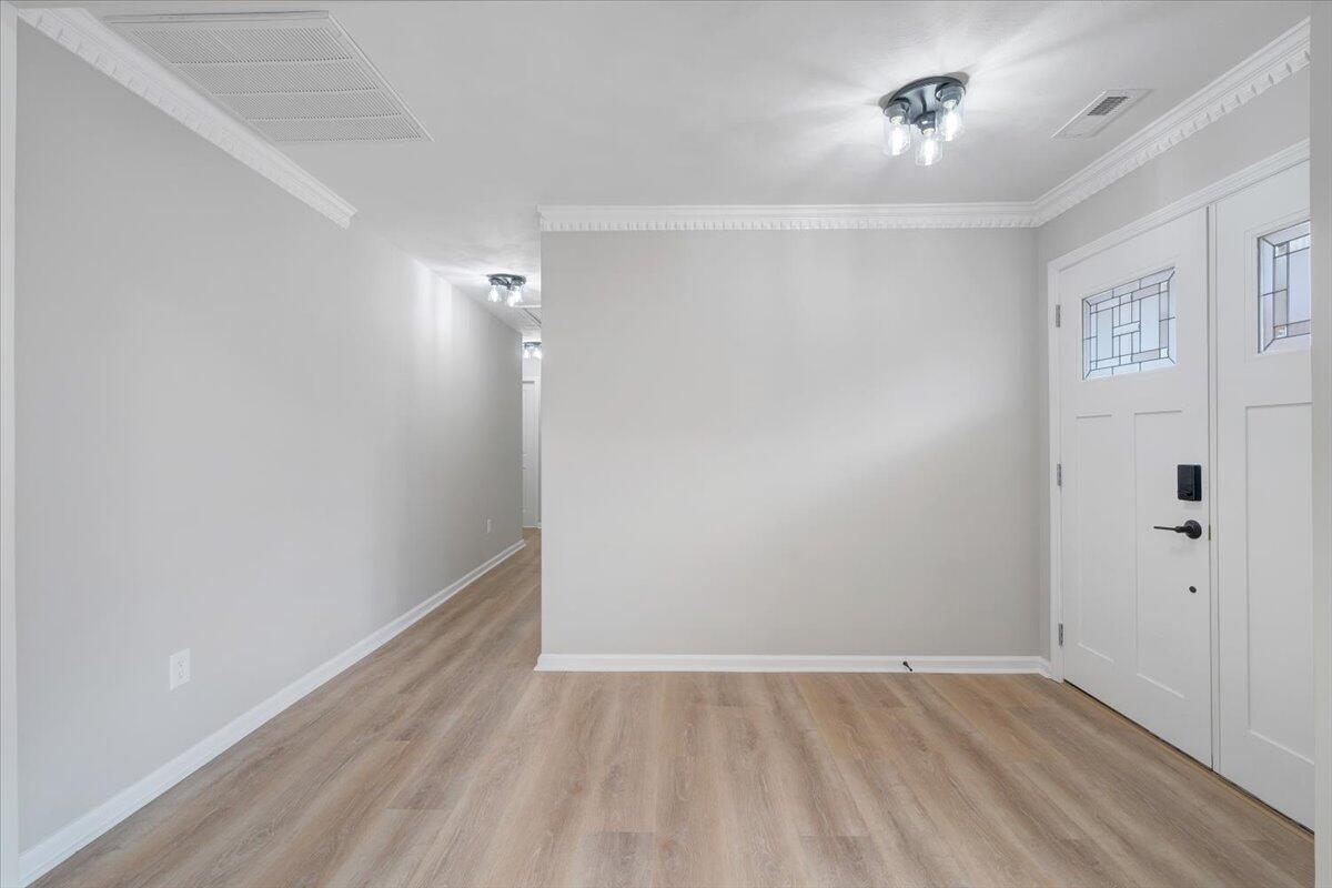 7951 Barrens Road Roanoke, VA 24019 - Photo 7 of 105 a view of an empty room with wooden floor