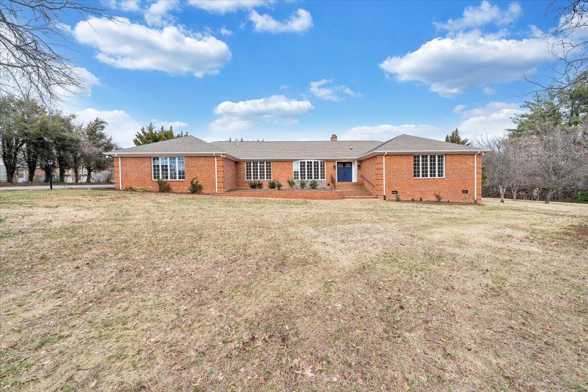 7951 Barrens Road Roanoke, VA 24019 - Photo 81 of 105 a view of a house with a big yard and large trees