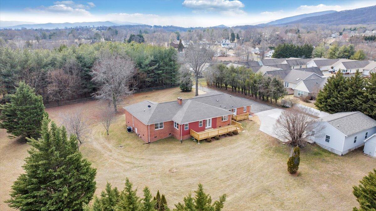 7951 Barrens Road Roanoke, VA 24019 - Photo 85 of 105 an aerial view of a house with a yard and lake view