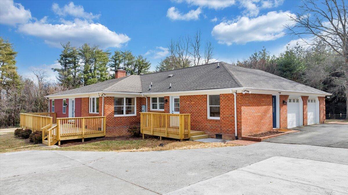 7951 Barrens Road Roanoke, VA 24019 - Photo 93 of 105 a front view of a house with a yard