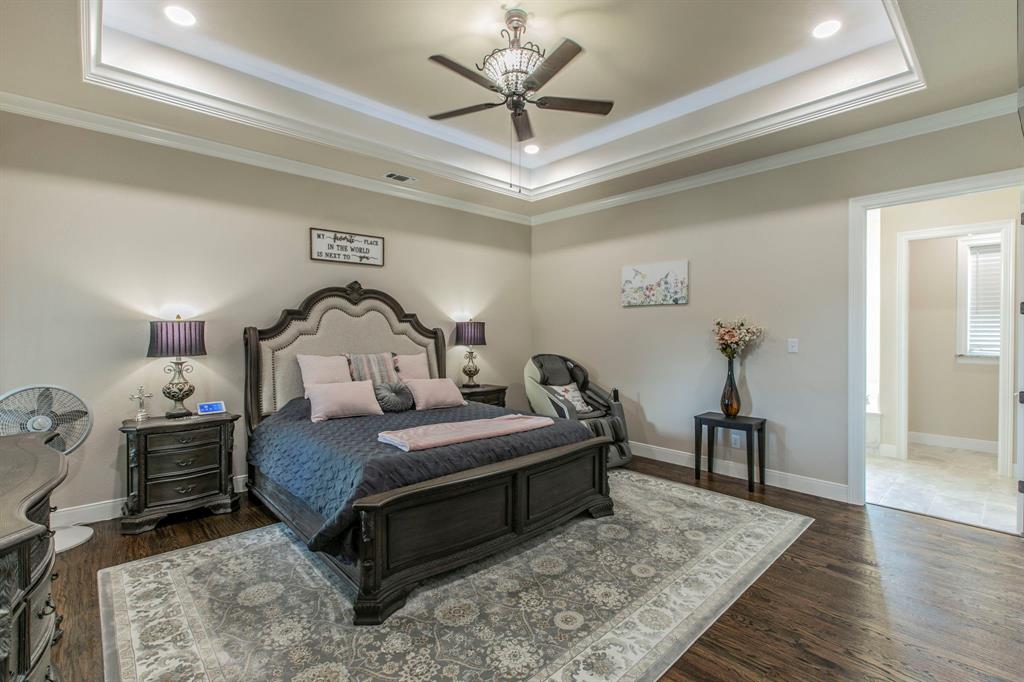 790 Bones Chapel Road Whitesboro, TX 76273 - Photo 15 of 36 a bedroom with a bed and a table