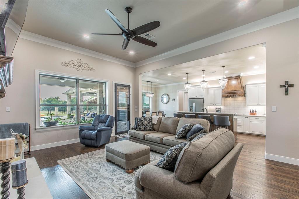 790 Bones Chapel Road Whitesboro, TX 76273 - Photo 2 of 36 a living room with furniture and a large window