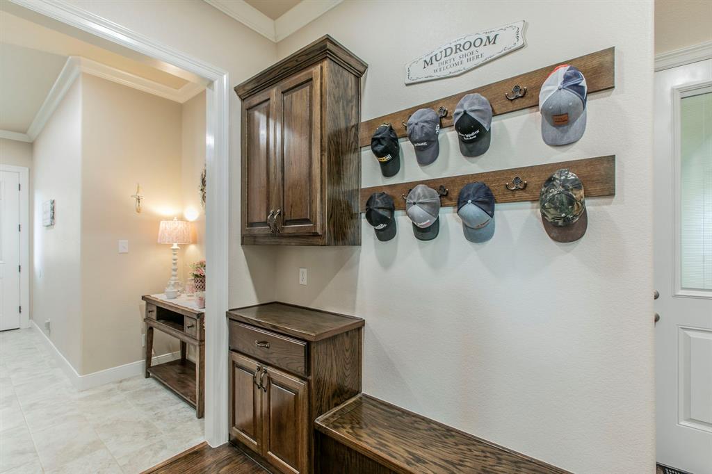 790 Bones Chapel Road Whitesboro, TX 76273 - Photo 24 of 36 a kitchen with a refrigerator and a stove