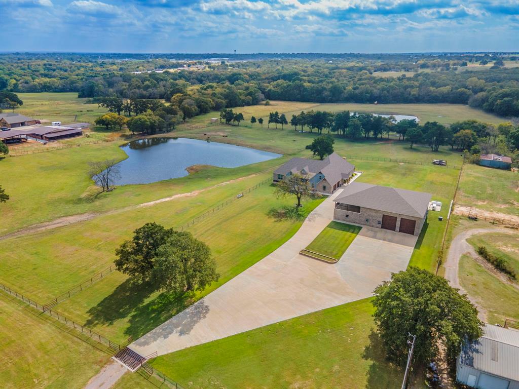 790 Bones Chapel Road Whitesboro, TX 76273 - Photo 33 of 36 an aerial view of a house with a swimming pool yard and outdoor seating