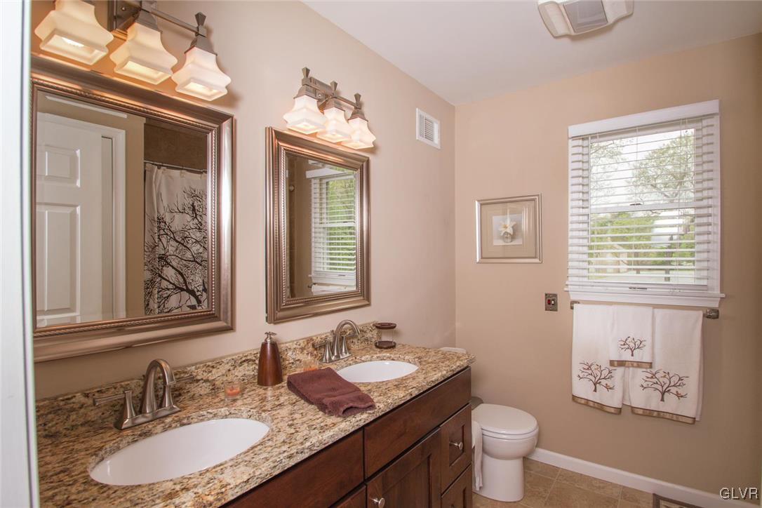 875 Barnsdale Road Bethlehem, PA 18017 - Photo 26 of 35 Upstairs bath features double sink with granite