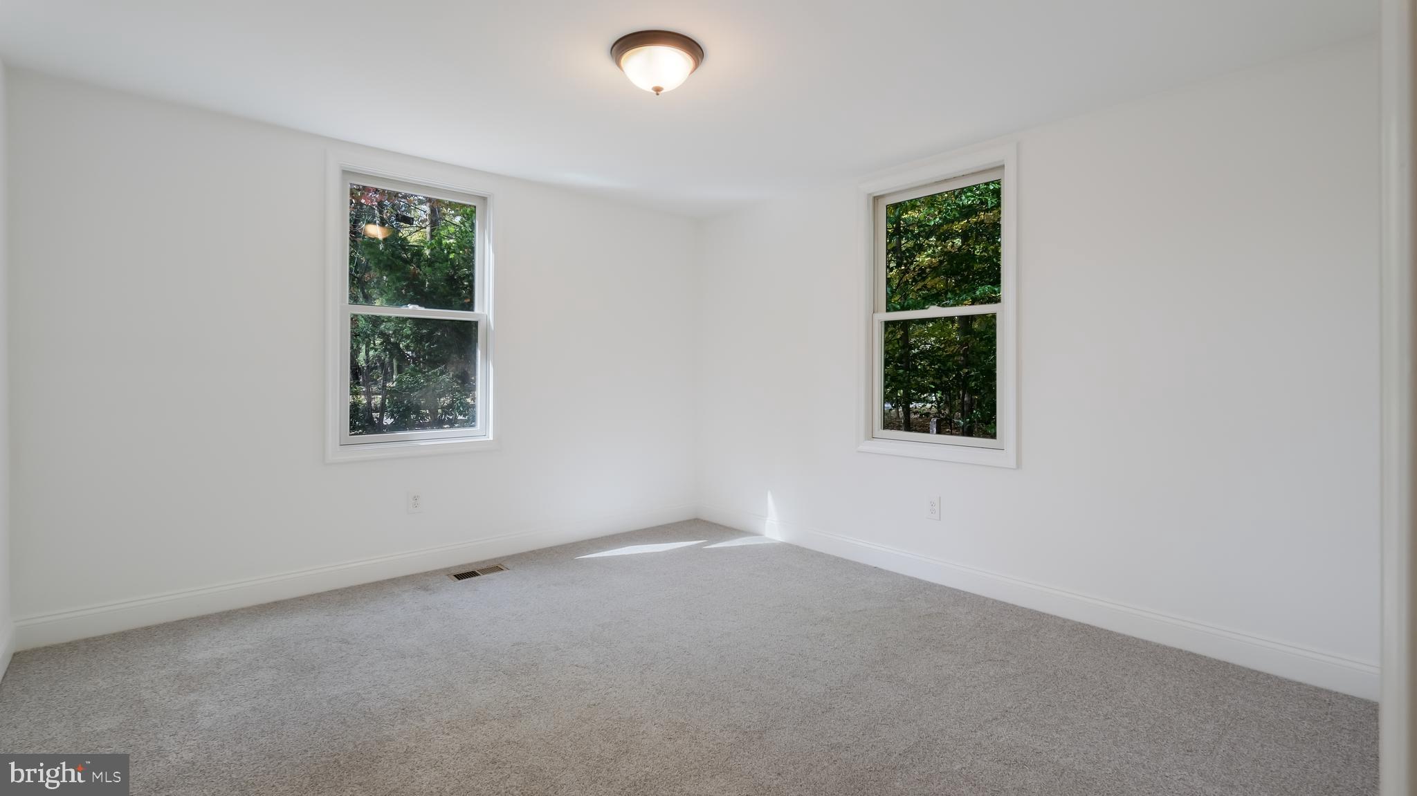 2443 Sugar Bottom Road Furlong, PA 18925 - Photo 15 of 39 an empty room with windows