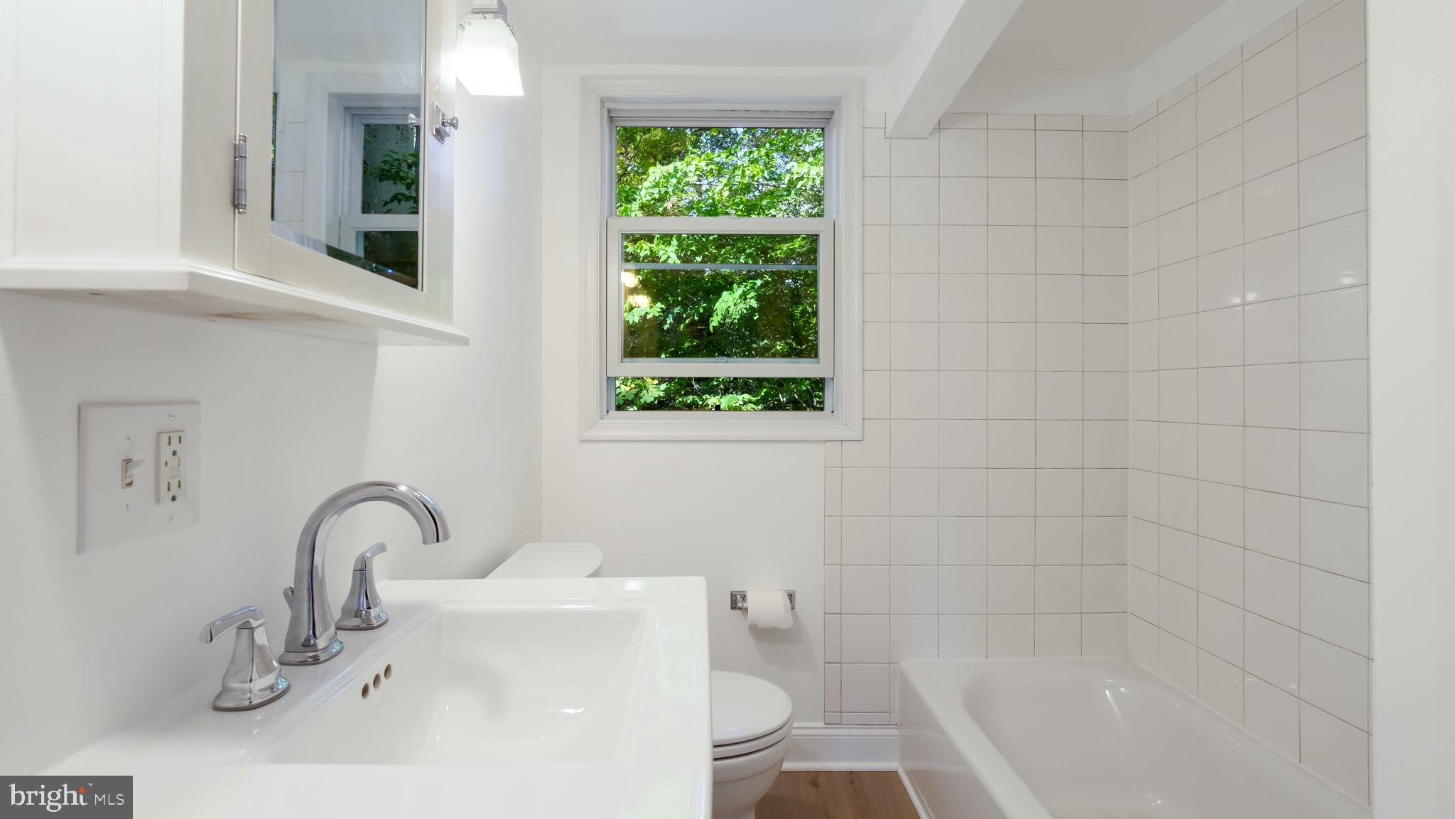 2443 Sugar Bottom Road Furlong, PA 18925 - Photo 16 of 39 a bathroom with a sink and a bathtub