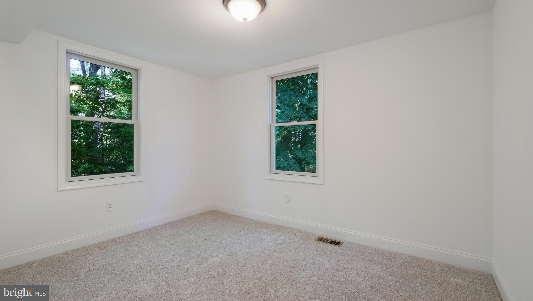 2443 Sugar Bottom Road Furlong, PA 18925 - Photo 18 of 39 an empty room with a window
